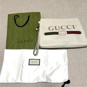 Gucci White Clutch with Green and Red Accents